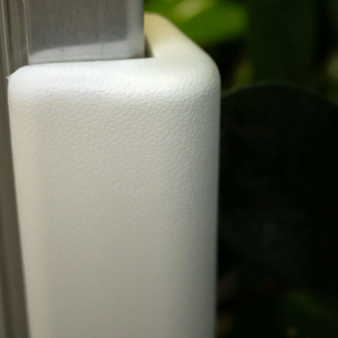 Astro Corner Guard UV White colour installed on a wall edge